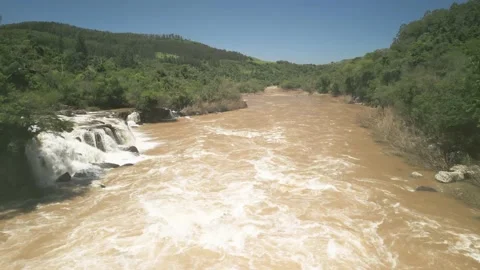 Flying over a river amid waterfalls and beautiful nature. Salto Saudades. 4K. Video stock 233219767