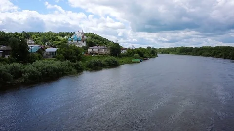 Flying over the river and beautiful views of the temples in Gorokhovets Stock Footage 73619863