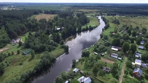 Flying over the river and the forest Stock Footage 75979350