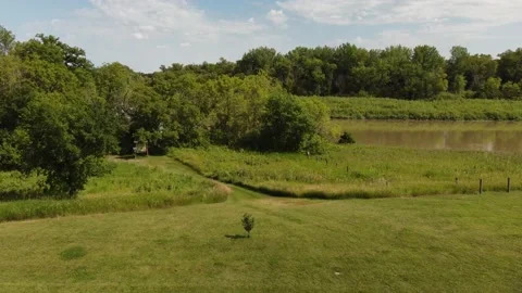 Flying over river and forest at Beaudry provincial park in Manitoba Stock Footage 204964616