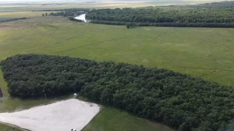 Flying over river and forest and parking lot at Beaudry provincial park Stock Footage 204964721