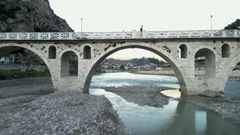 Flying over a river below a bridge Stock Footage 270166722