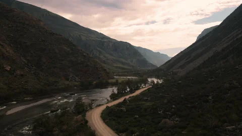 Flying over the river between the mountains in the gorge. Altai Stock Footage 166070040