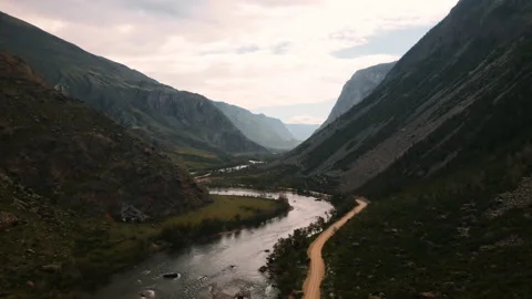 Flying over the river between the mountains in the gorge. Altai Stock Footage 166070111