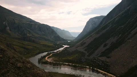 Flying over the river between the mountains in the gorge. Altai Stock Footage 166070136