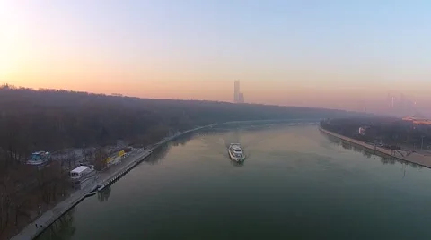 Flying over the river boat at sunset, flying over the river Stock Footage 45985050