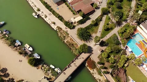 Flying Over River Bridge and Holiday Area Stock Footage 289033395