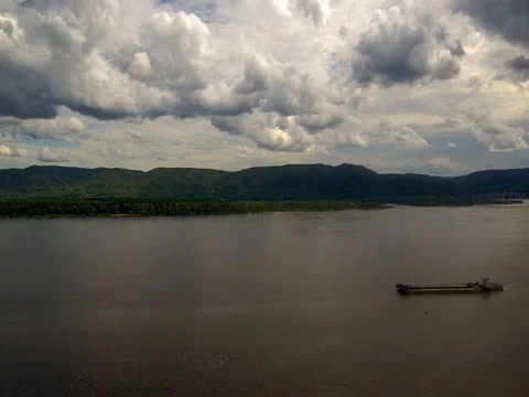 Flying over the river cargo ship. Stock Footage 77474991