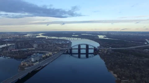 Flying over the river in the city. Sunset Stock Footage 58611077