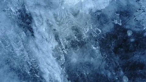 Flying over the river covered with ice and snow Stock Footage 72997418