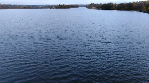 Flying over the river at dawn in the fall. Panoramic views of the river. Video stock 118154082