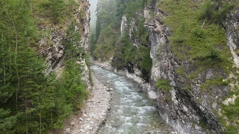 Flying over a river in a deep mountain gorge. Stock Footage 170043014