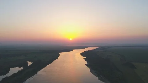 Flying over the river during sunset, amazing aerial view Stock-Footage 117863598