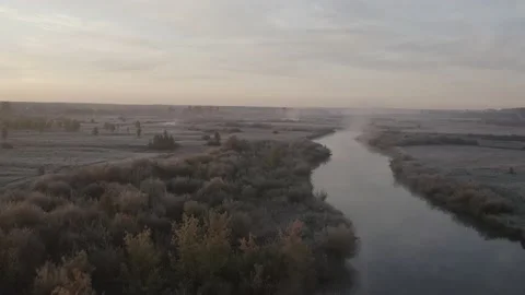 Flying over the river, forest, field. Shooting 4K. 10 Bit (DLog-M) Stock Footage 150804821
