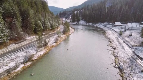 Flying Up Over A River In the Forrest During Winter Stock-Footage 143638099