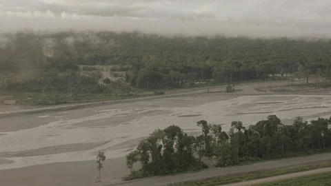 Flying over a river in the jungle Stock Footage 69772468