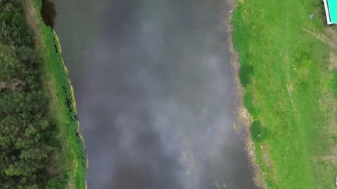 Flying over the river in the nature Stock Footage 246580994
