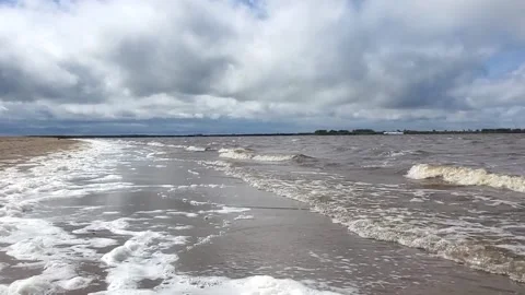 Flying over the river over lead storm water with foam during a storm Stock Footage 154654929