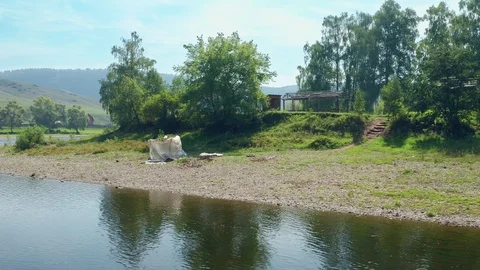 Flying over the river overlooking the river bank. Stock Footage 114728994