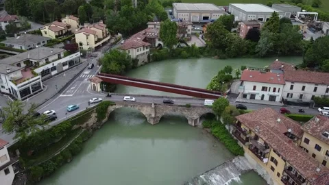 Flying over a river passing over a bridge Stock Footage 154478659