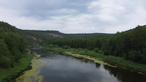 Flying over the river on a quadcopter for ambient video Stock Footage 246581353