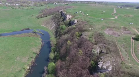 Flying over the river, the rock Stock Footage 66571203