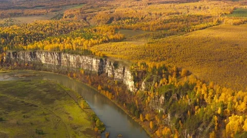 Flying over the river, rocks and beautiful forest with autumn colors. Stock Footage 142888155