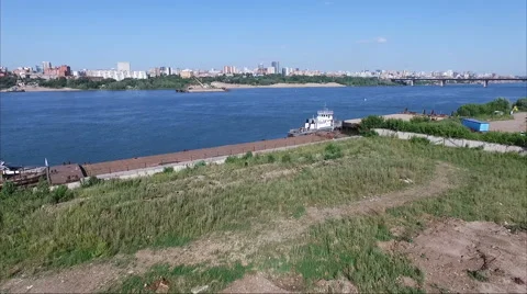 Flying over the river. A ship on the river. Stock Footage 60761813