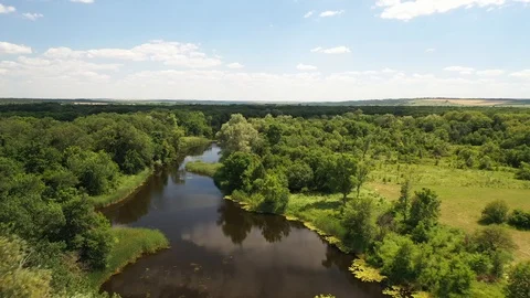 Flying over the river, shooting from a drone. Beautiful view from above Stock Footage 121970468