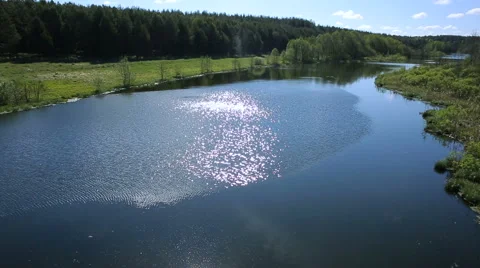 Flying over the river in the summer Stock Footage 65785259