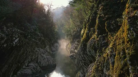 Flying over a river through a narrow canyon with white rocks, Sochi. Devils gate Stock-Footage 184309048