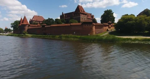 Flying Over River. View On Medieval Castle In Malbork Stock Footage 93215290