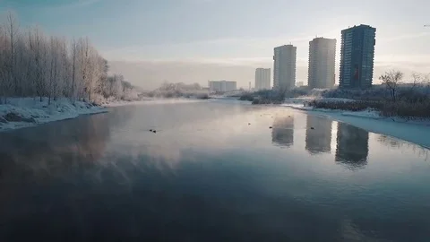 Flying over the river in the winter in the city Stock Footage 72232666
