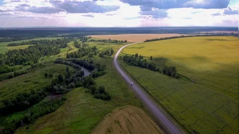 Flying over the road and the river. Stock Footage 79051679