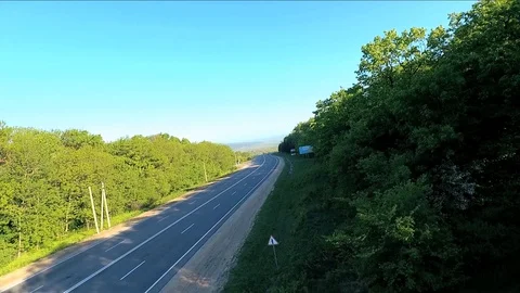 Flying over road and trees Vídeos de archivo 89639682