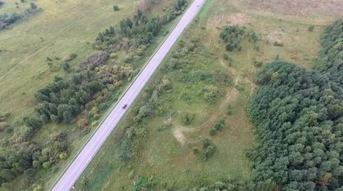Flying over the road in the fall Stock-Footage 68165905