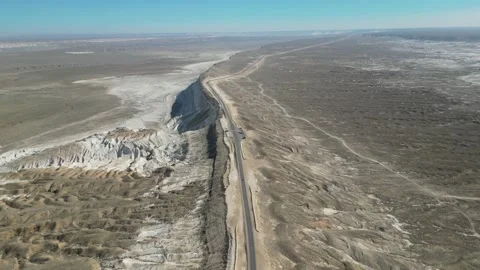 Flying over a road in a mountain desert Stock Footage 237693526