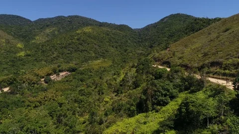 Flying over Road in the Mountains Stock Footage 79660089