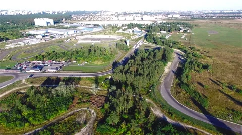 Flying over road racing track 4k aerial video. Races: off-road circuit motocross Stock Footage 67862193