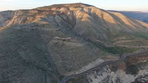 Flying over the road from Yarmouk Valley onto Golan Heights. Israel. DJI-0066-06 스톡 동영상 124407622