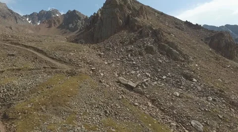 Flying over the rocks and moraines. Stock Footage 68451288