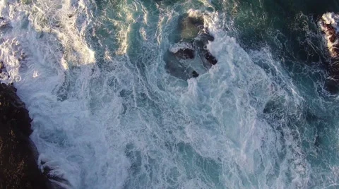 Flying over the Rocks and Ocean Waves Stock Footage 46223498