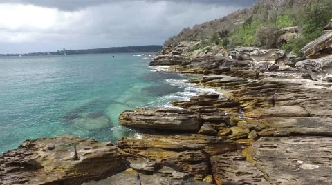 Flying over rocks and water Stock Footage 62461850