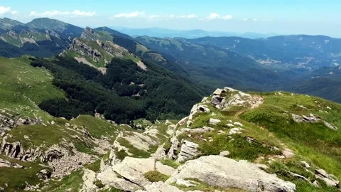 Flying over the rocks on top of the mountain Stock Footage 134007660