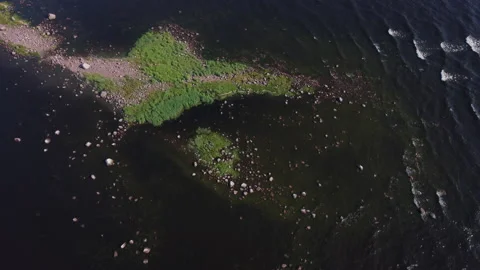 Flying over rocks in the water Stock Footage 160480066