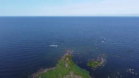 Flying over rocks in the water Stock Footage 160480127