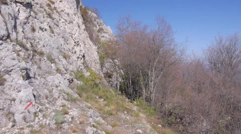 Flying over the rocky mountain peak 動画素材 48846418
