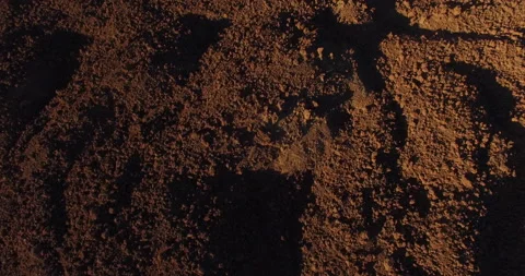 Flying over a rocky mountain peak on a drone. Stock Footage 237480636