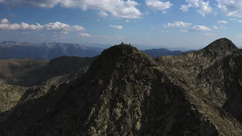 Flying over rocky mountain summit. Pyrenees, Andorra, 2020 Stockbeeldmateriaal 131380161