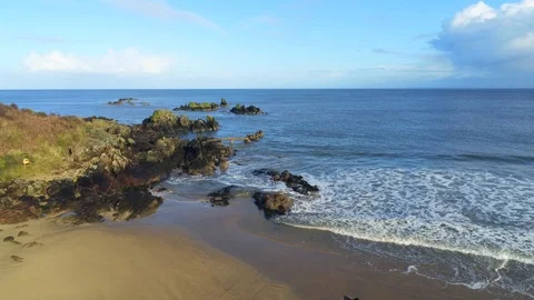 Flying over a rocky shore Stock Footage 103862014